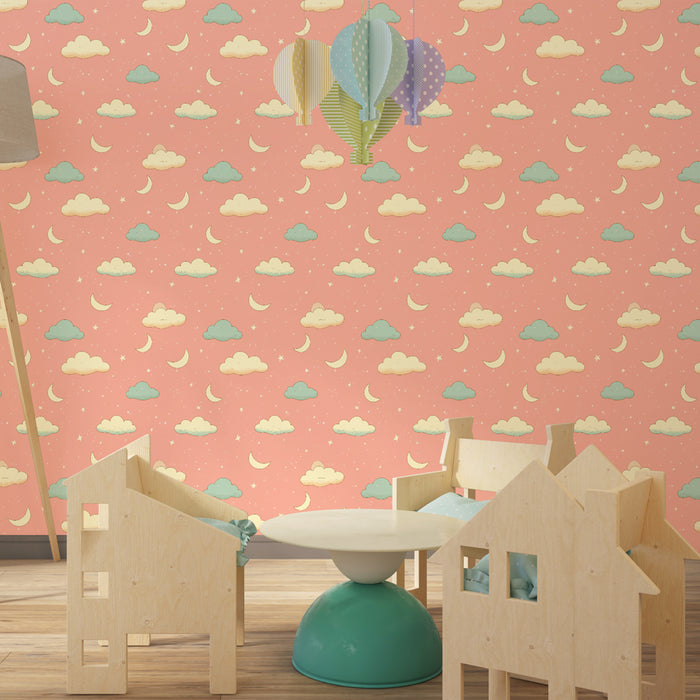 Papier peint chambre enfant à motifs | Nuages et croissants de lune sur fond rose