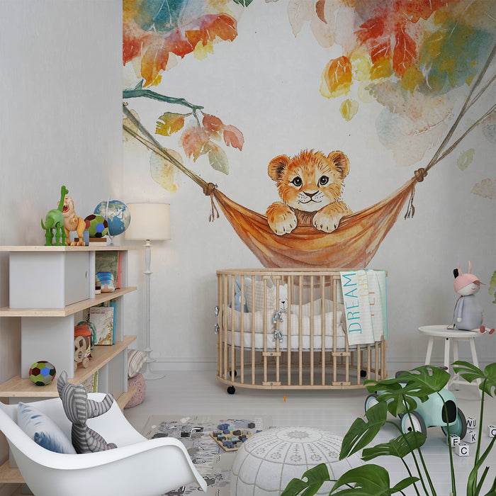 Papier peint chambre bébé | Lionceau dans un hamac de feuillage