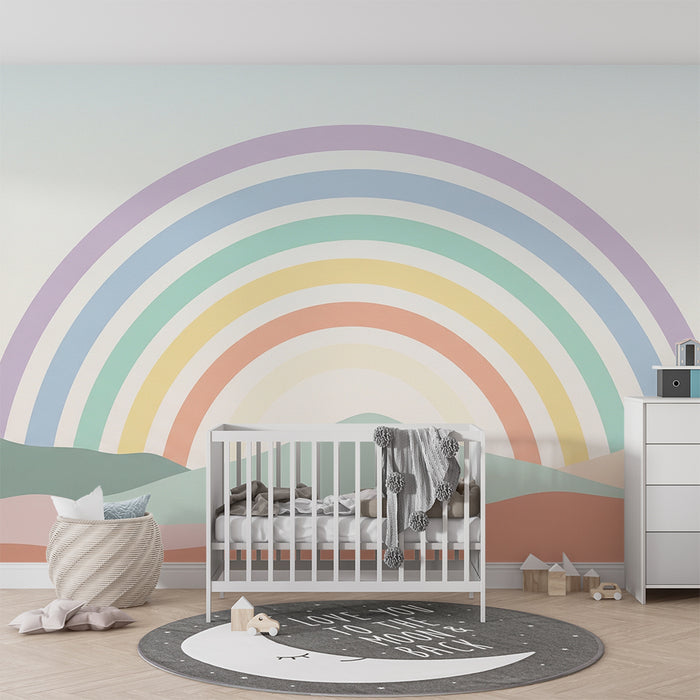Babykamer behang | Pastel regenboog over een zachte landschap
