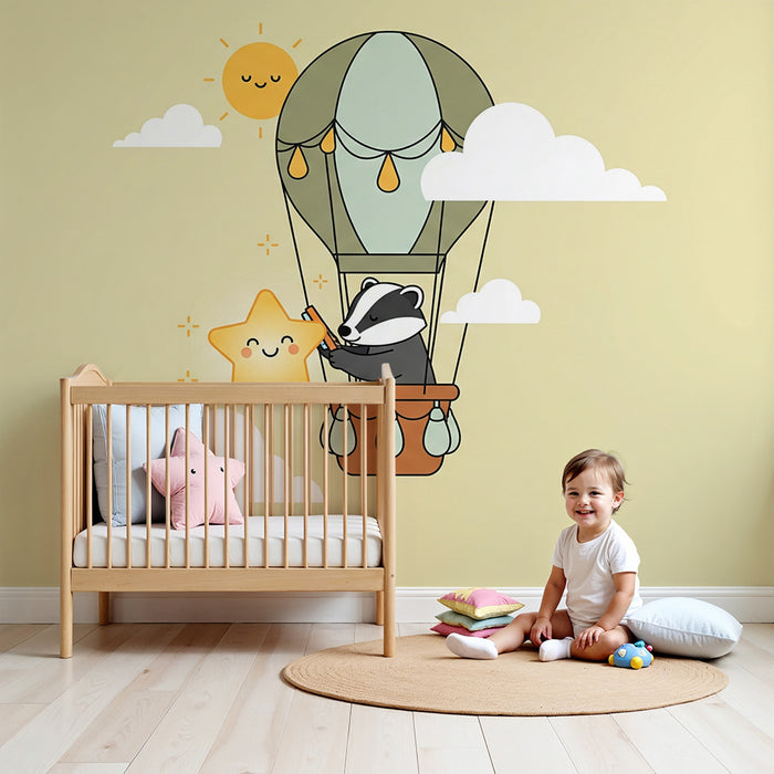 Behang voor babykamer | Das in een luchtschip met sterren en wolken