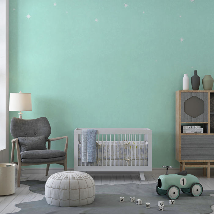 Babykamer behang | Sterrenhemel op rustgevende muntgroene achtergrond