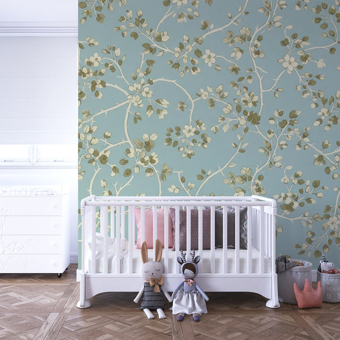 Papier peint chambre bébé | Décor de fleurs délicates sur fond bleu apaisant