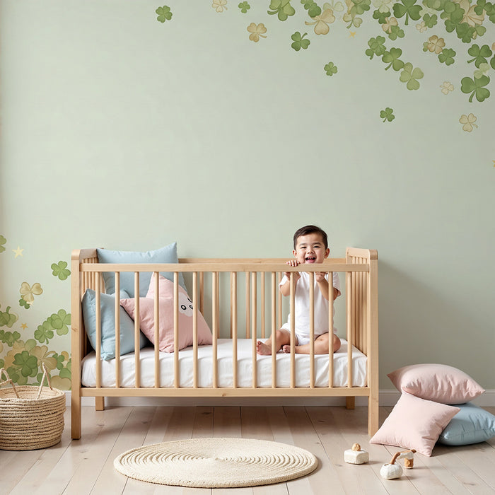 Papier peint chambre bébé | Douces feuilles de trèfle sur fond pastel