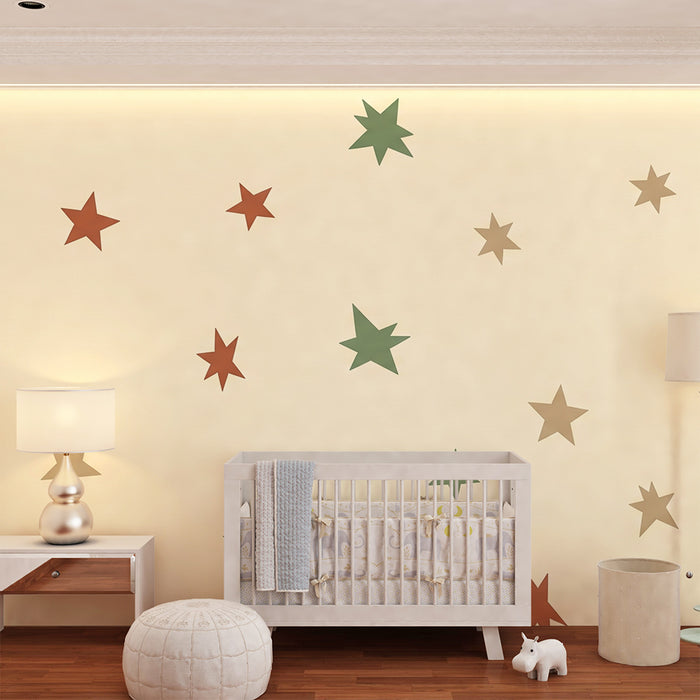 Papel de parede quarto bebê | Estrelas coloridas em fundo suave