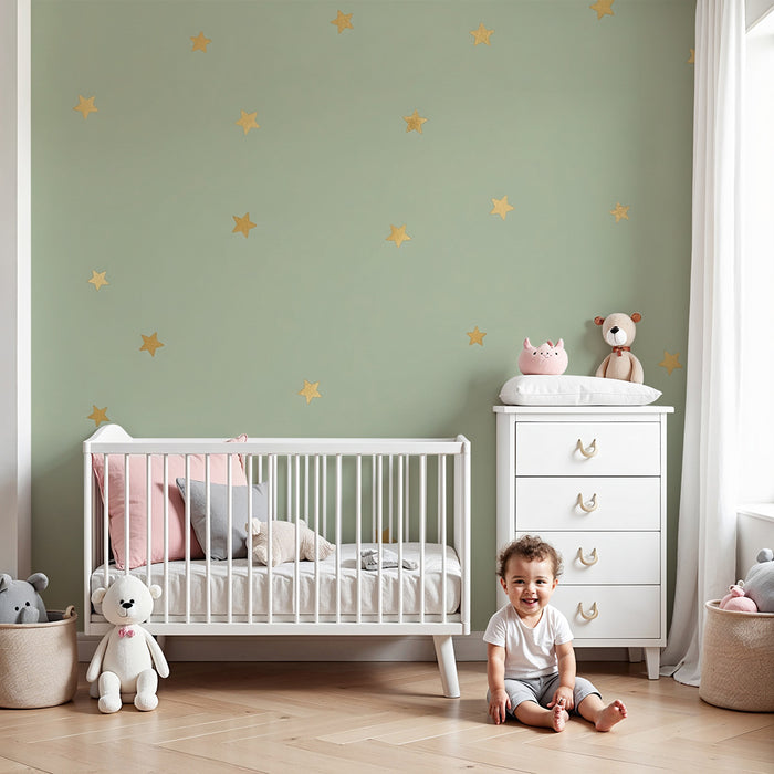 Papel de parede quarto bebê | Estrelas douradas em fundo verde suave