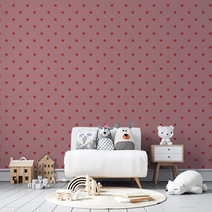 Papel de parede para quarto de bebé | Estrelas vermelhas sobre fundo rosa suave