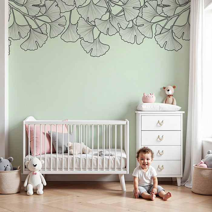 Papel de parede para quarto de bebé | Folhas de ginkgo delicadas sobre fundo verde pastel