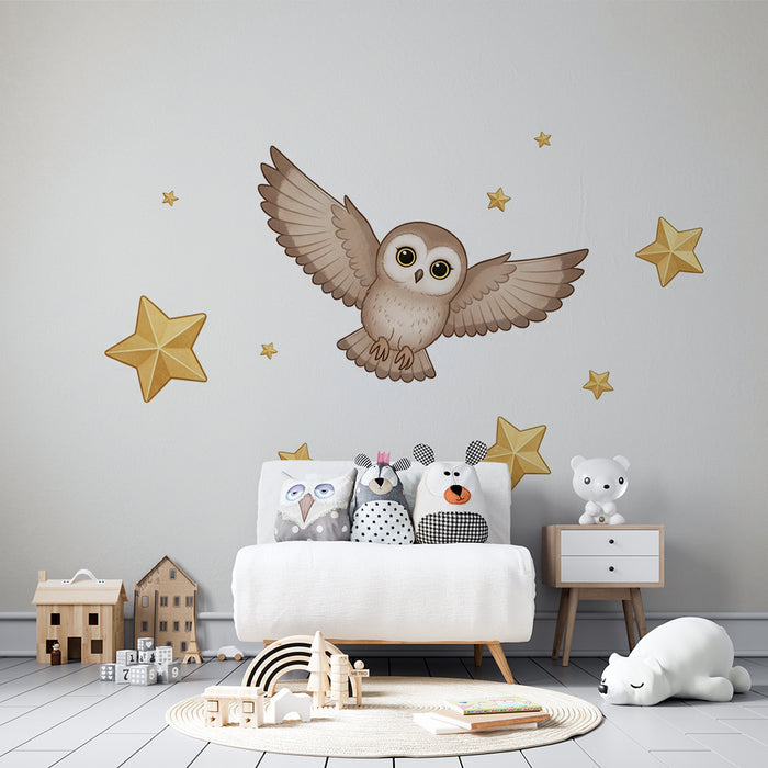 Barntapet | Flygande uggla bland gyllene stjärnor