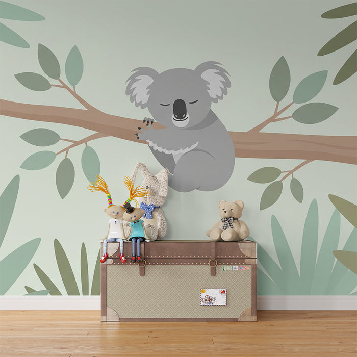Nursery room wallpaper | Sleeping koala on a branch in the midst of soft foliage