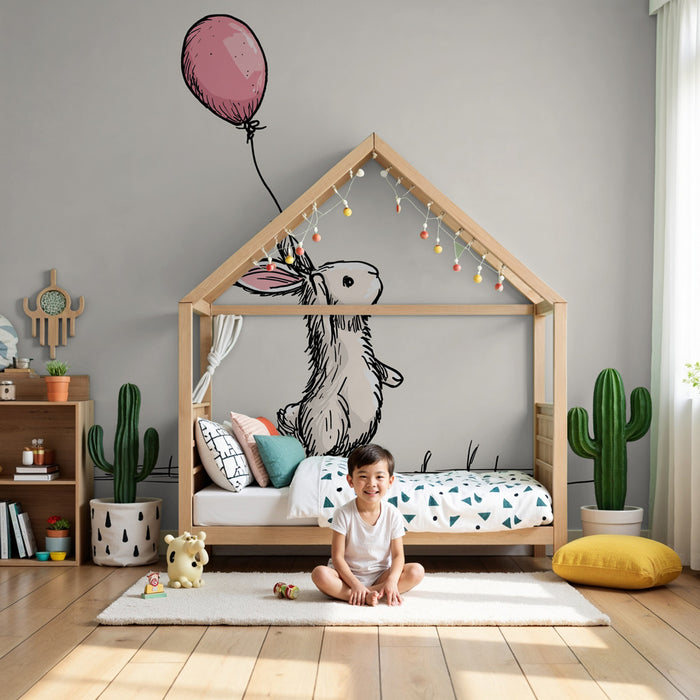 Papier peint chambre bébé | Lapin espiègle avec ballon rose