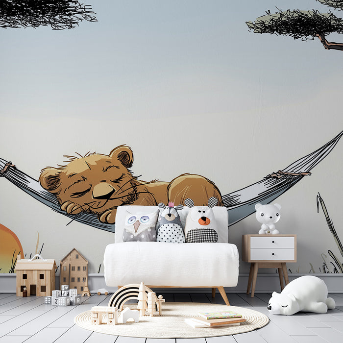 Barntapet | Sovande lejonunge i en hängmatta under solnedgången