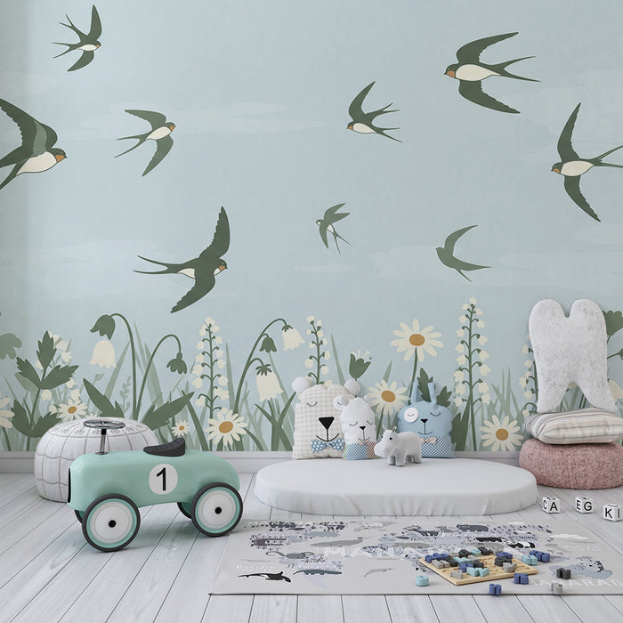 Papier peint chambre bébé | Oiseaux en vol au-dessus d'un champ de fleurs délicates