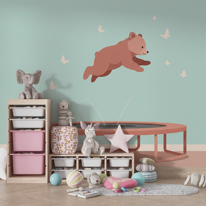 Papier peint chambre bébé | Ourson sautant parmi les papillons