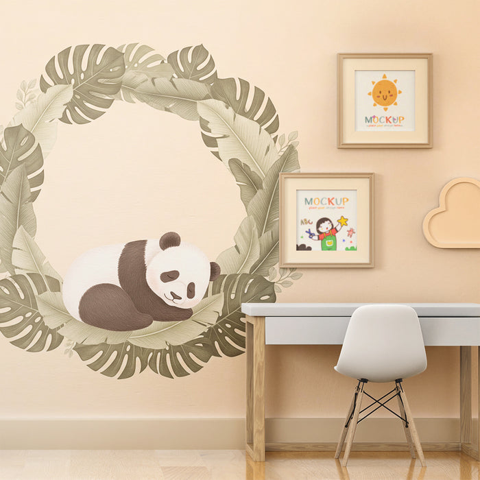 Papier peint chambre bébé | Panda endormi dans un cadre de feuillage