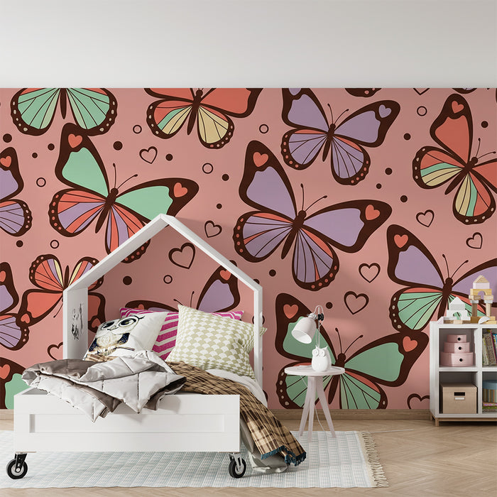 Behang voor babykamer | Kleurrijke vlinders op roze achtergrond met hartjes