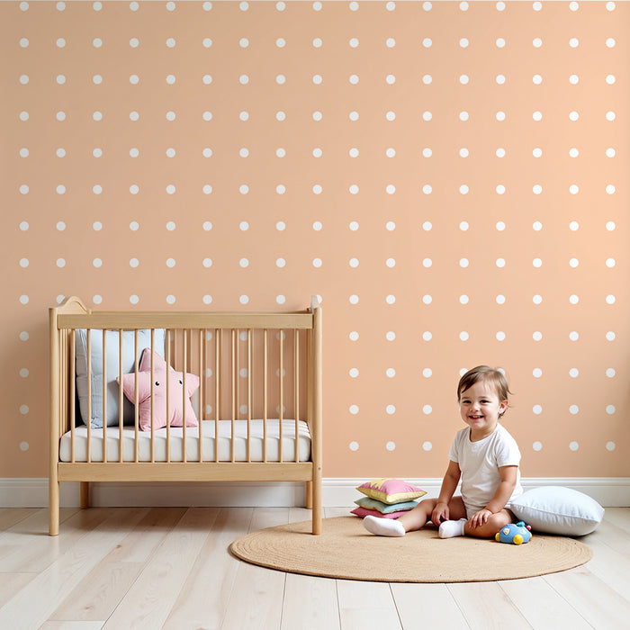 Nursery room wallpaper | White dots on soft peach background