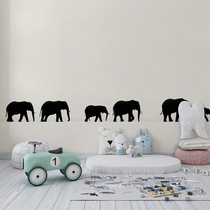 Papel de parede quarto bebê | Silhuetas de elefantes caminhando em um fundo suave