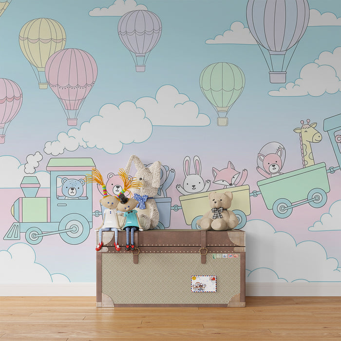 Papel de parede quarto bebê | Comboio colorido com animais e balões de ar quente num céu pastel