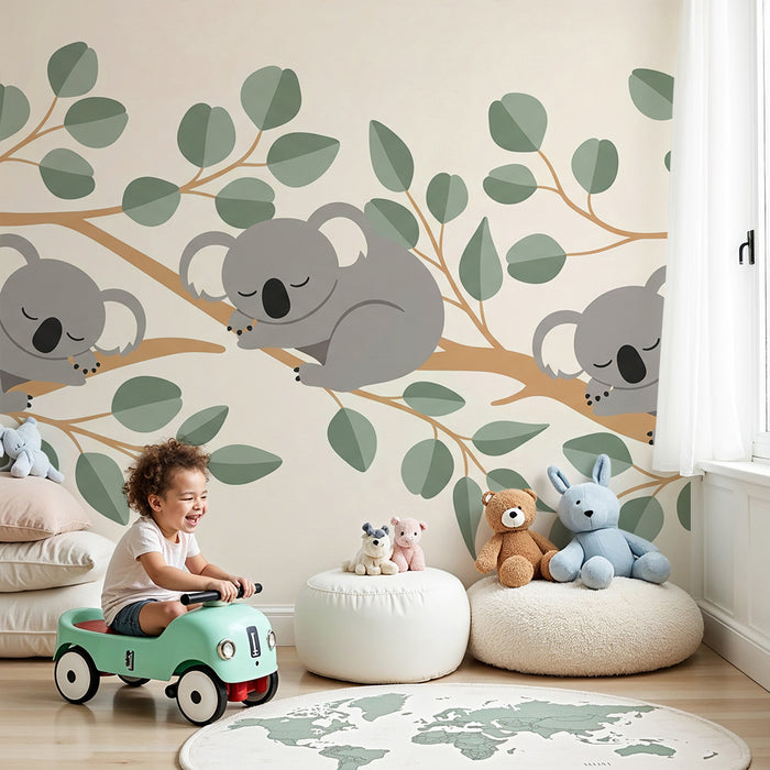 Papier peint chambre bébé | Trois koalas endormis sur des branches feuillues