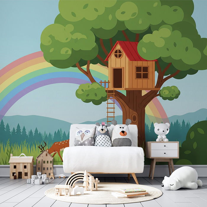 Behang kinderkamer | Boomhut onder een mooie regenboog