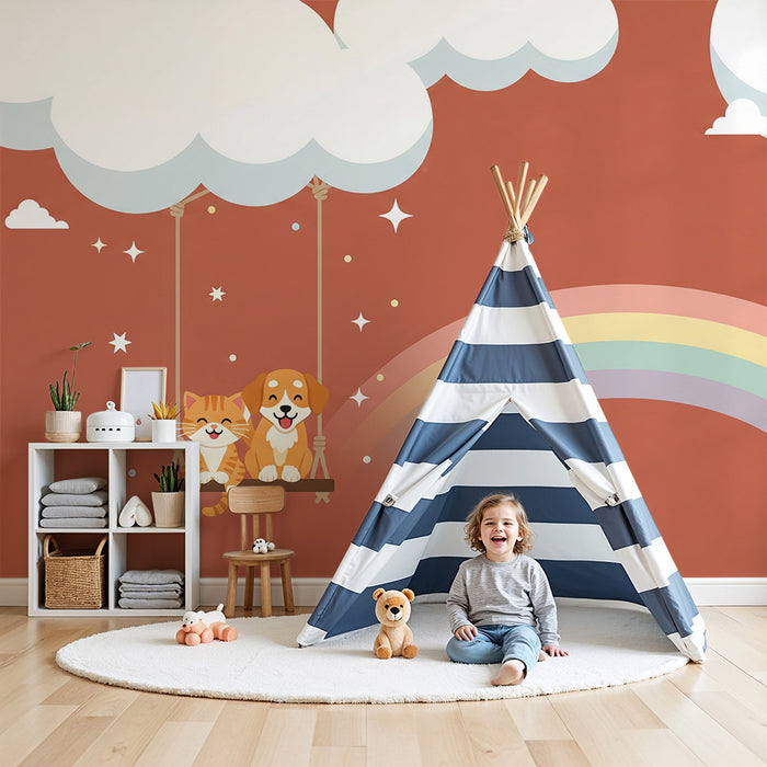 Papel de parede para quarto de criança | Gatos e cães felizes num baloiço com um arco-íris
