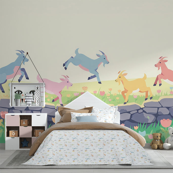 Kinderzimmer Tapete | Bunte Ziegen springen über eine blumige Mauer.