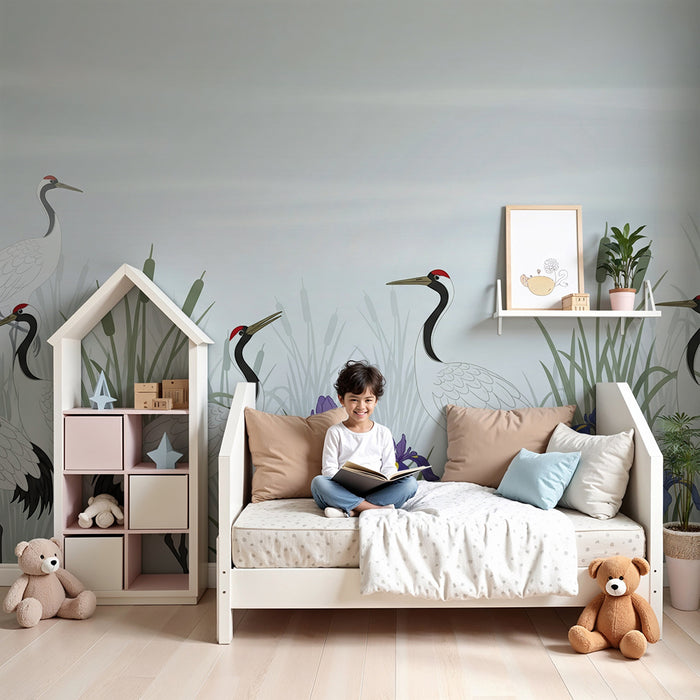 Papier peint chambre enfant | Grues élégantes au milieu des iris dans un paysage apaisant