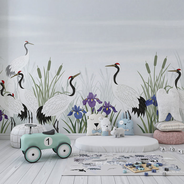 Papier peint chambre enfant | Grues élégantes au milieu des iris dans un paysage apaisant