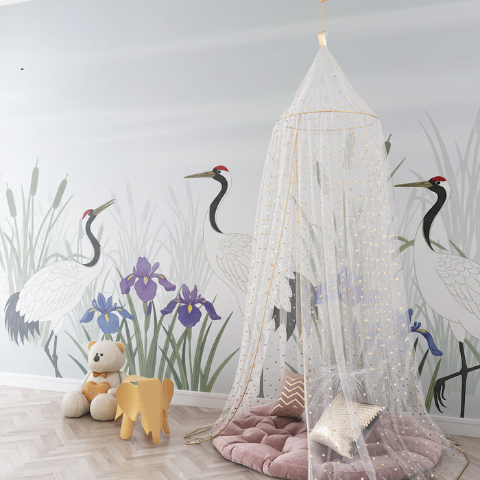 Papier peint chambre enfant | Grues élégantes au milieu des iris dans un paysage apaisant