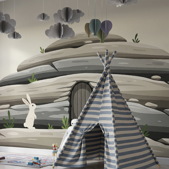 Papel pintado infantil | Conejito curioso ante una puerta misteriosa en un paisaje rocoso