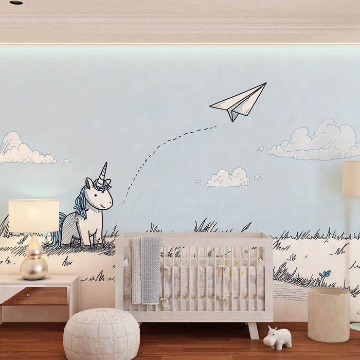 Barntapet | Drömmande enhörning och pappersflygplan i en blå himmel