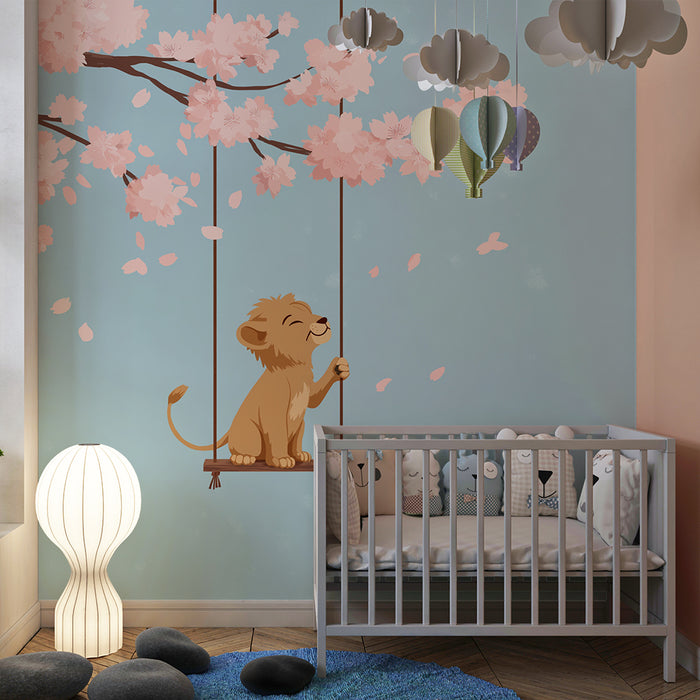 Papier peint chambre enfant | Petit lion sur une balançoire sous un cerisier en fleurs