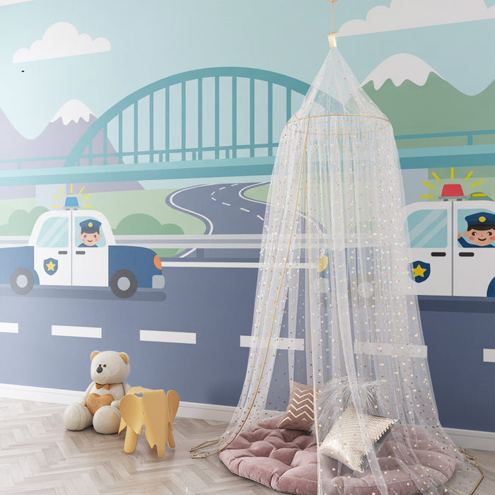 Behang voor kinderkamer | Politiewagens op een kronkelende weg met bergen op de achtergrond